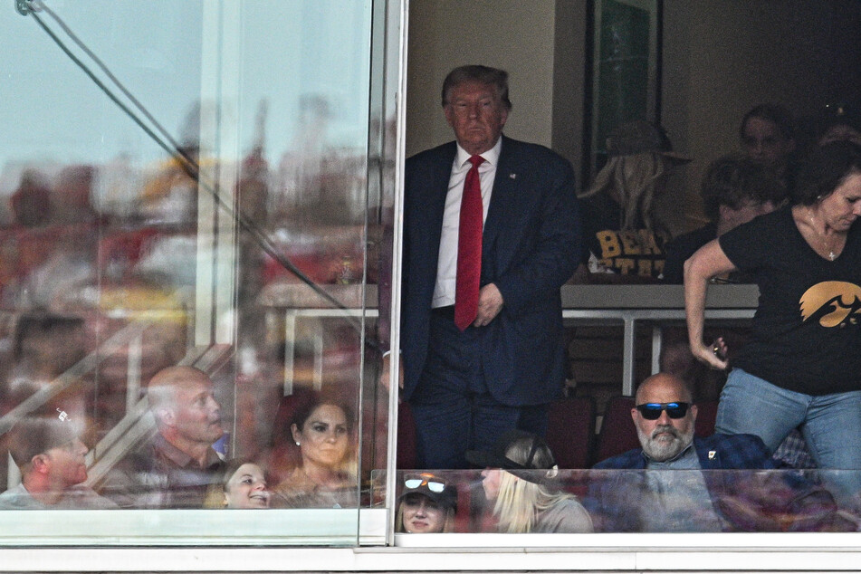 Donald Trump booed and flipped off at Iowa college football showdown