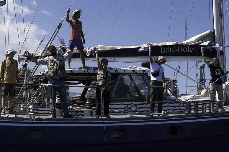 Members of the crew of Madleen are pictured en route to Gaza to deliver humanitarian aid in a photo released on June 2, 2025.