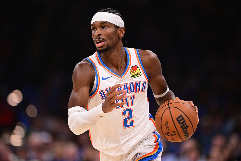 Shai Gilgeous-Alexander of the Oklahoma City Thunder handles the ball during the second half against the Phoenix Suns at Paycom Center.