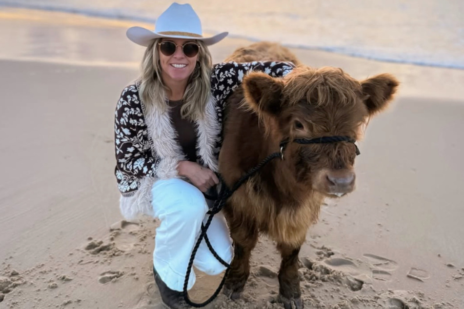 Farmer Brooke Atkins was recently at the beach with her cow, Matilda.