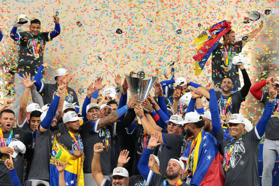 Venezuela reacts on the stage after defeating the USA in the World Baseball Classic Championship game on March 17, 2026.