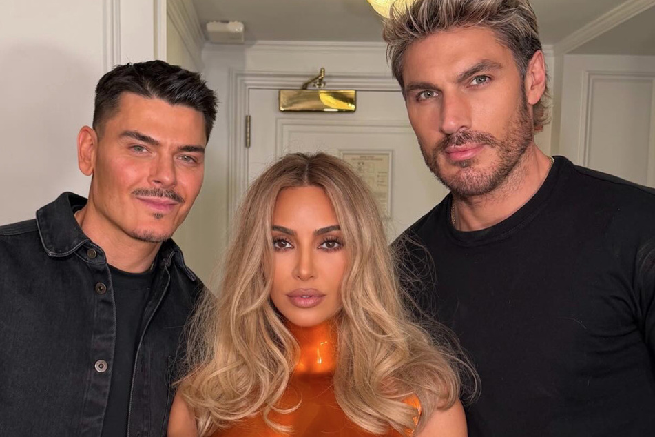 Chris Appleton (r.) has worked with Kim Kardashian (c.) for years.
