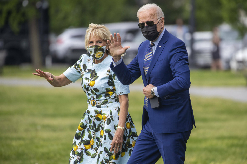 Joe and Jill Biden walk to board Marine One as they depart for Georgia.