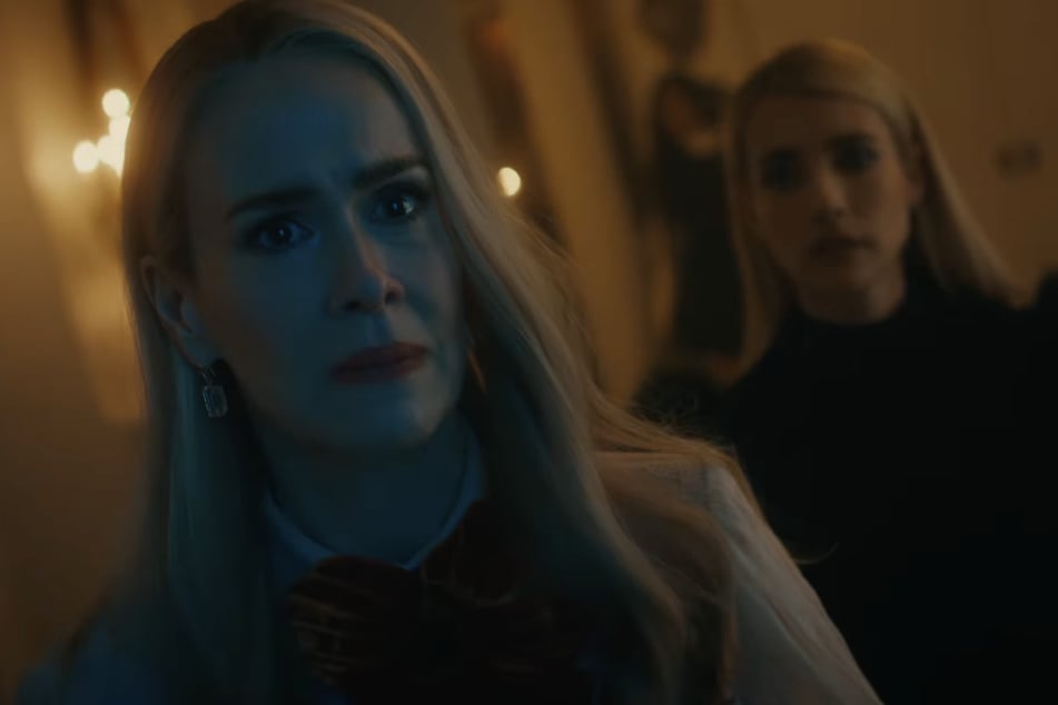 Sarah Paulson and Emma Roberts (r.) reprise their respective roles as Cordelia Goode and Madison Montgomery from AHS season three in the 13th season of Ryan Murphy's horror anthology.