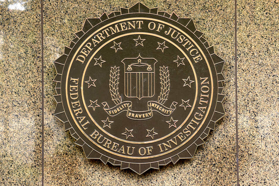The admitted Chinese spy previously worked for the FBI until 2012.