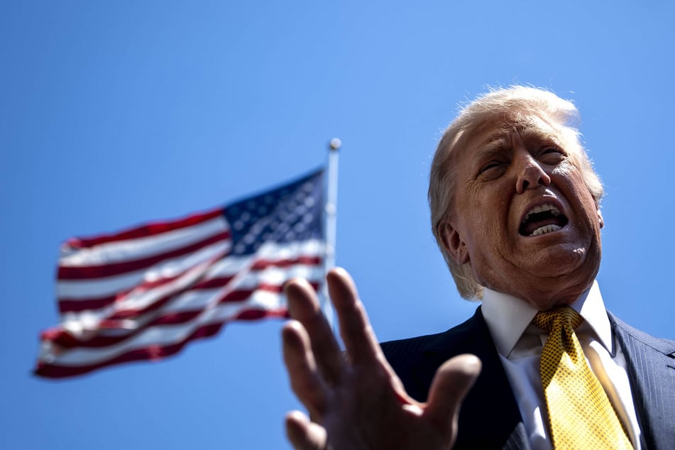 Donald Trump has urged a balanced approach that addresses AI security risks while maintaining US competitiveness.