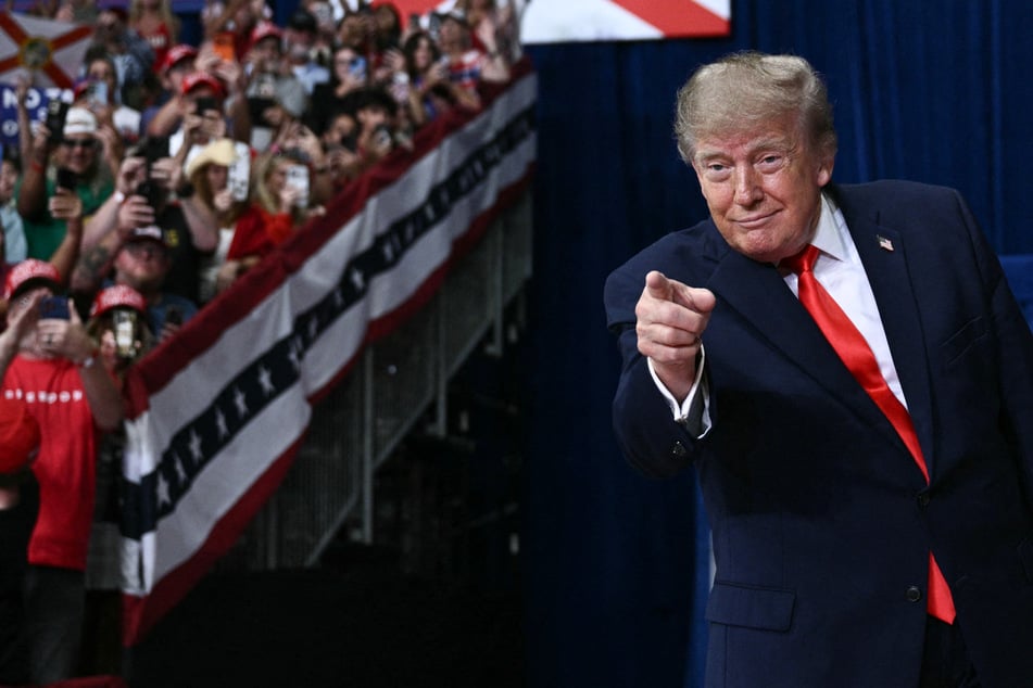 President Donald Trump arrives to speak at a midterm campaign rally at the Ocean Center in Daytona Beach, Florida, on Friday. Trump's plan to deport Afghans through Pakistan has sparked backlash from immigrants' rights groups. 