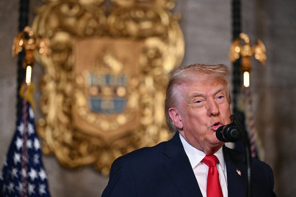 US President Donald Trump speaks to the press at Mar-a-Lago in Palm Beach, Florida, on Monday.