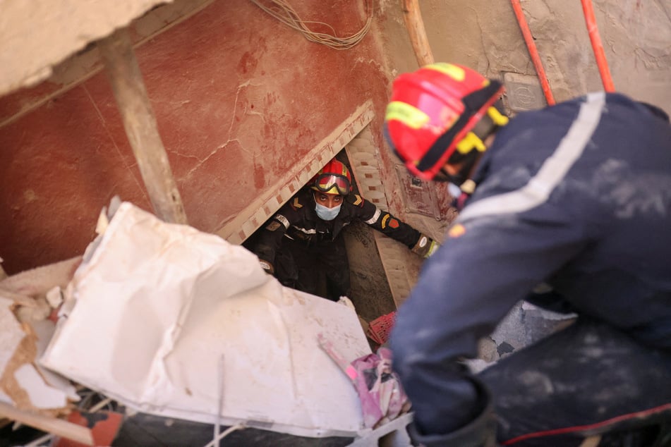 Search and rescue teams continue to work to find survivors trapped under the rubble in villages and towns.