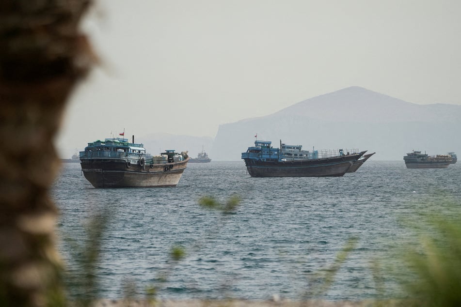 Vessels sail through the Strait of Hormuz, Musandam, Oman, on May 22, 2026.