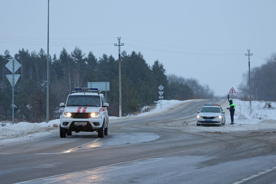 Authorities arrive at the scene of the plane crash in the Korochansky district of Belgorod.