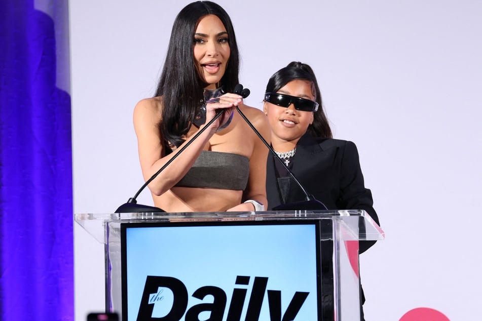 There is no sign of Kim Kardashian's (l.) daughter North West in the family's 2025 Christmas pictures.
