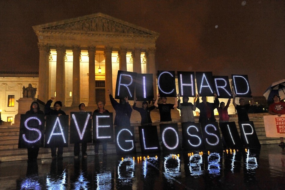 Anti-death penalty activists rally outside the US Supreme Court to prevent the execution of Richard Glossip.
