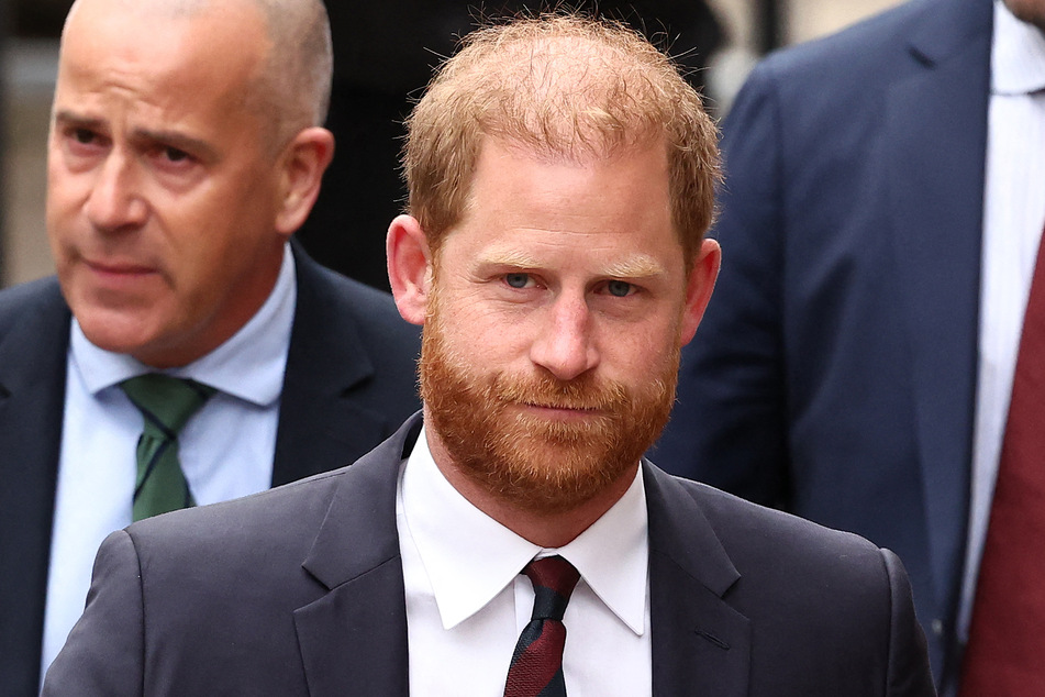 Prince Harry admitted he is "exhausted and overwhelmed" as he battles to regain police protection for himself and his family when in the UK.