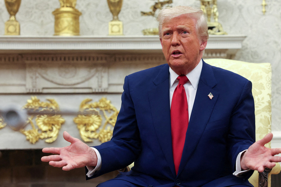 Trump "not happy" with Russia's actions as he issues rare public criticism