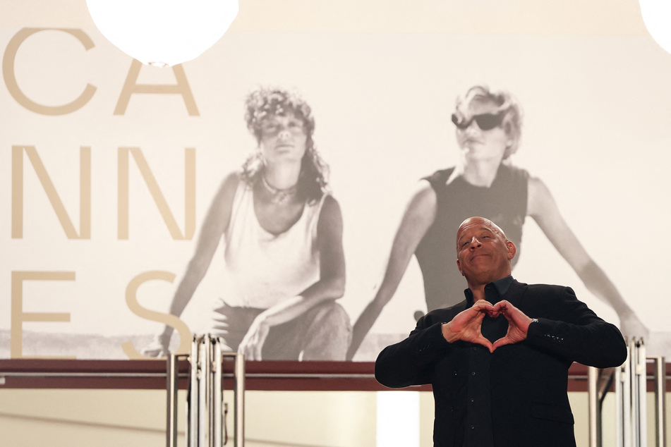 Vin Diesel gestures as he arrives for the screening of The Fast and the Furious at the 79th edition of the Cannes Film Festival on May 13, 2026.