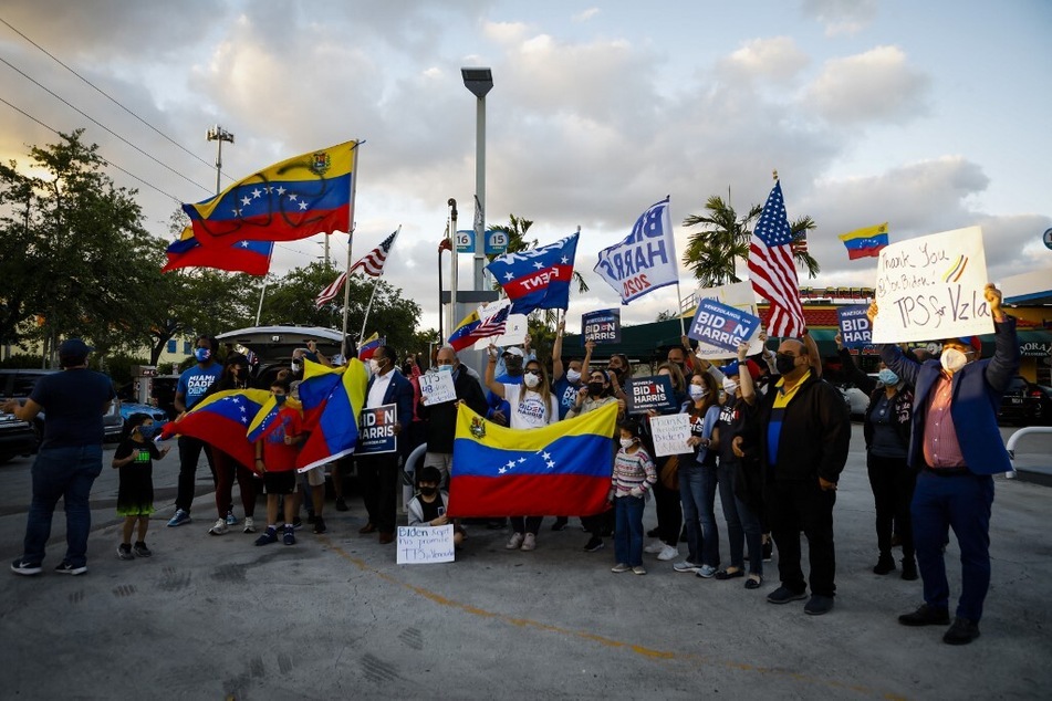 Venezuelans gather to celebrate the granting of TPS by President Joe Biden in Miami, Florida, on March 9, 2021.