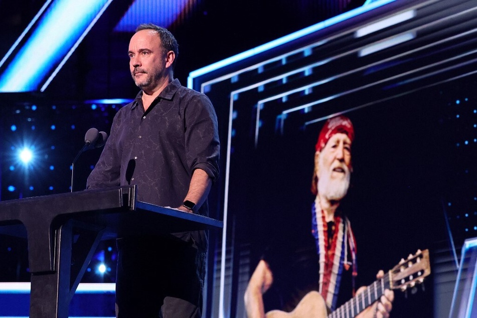 Dave Matthews speaks onstage about Willie Nelson during the 38th Annual Rock & Roll Hall Of Fame Induction Ceremony.