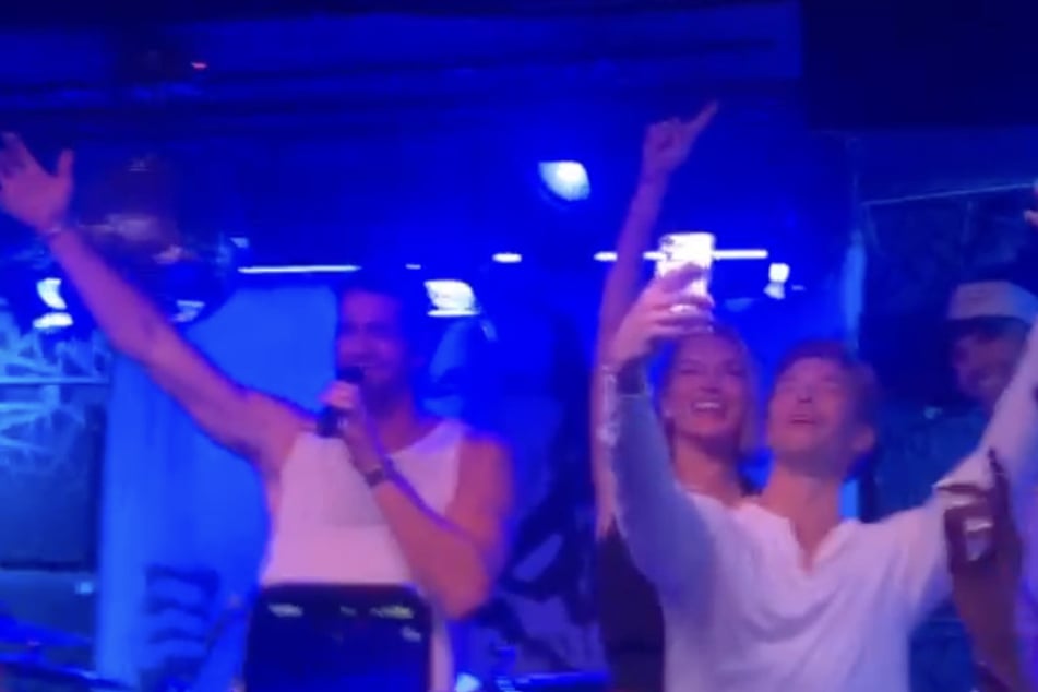 Carl Radke (r.), Kyle Cook, and Lindsay Hubbard (c.) joined Jesse Solomon on stage in Amagansett, New York, on August 23, 2026.
