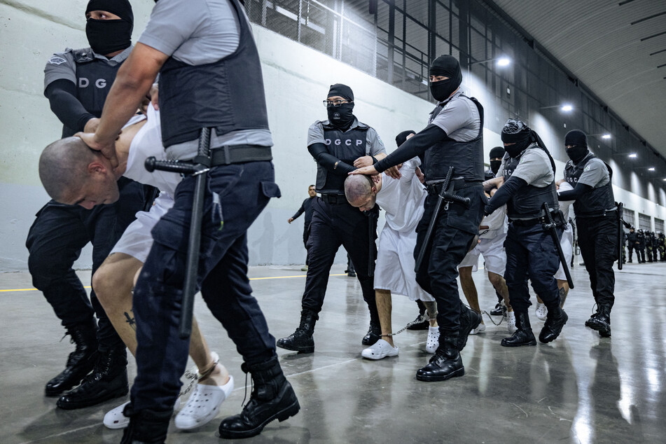 Human rights organizations have reported systematic torture of people deported by the US to El Salvador's CECOT prison.