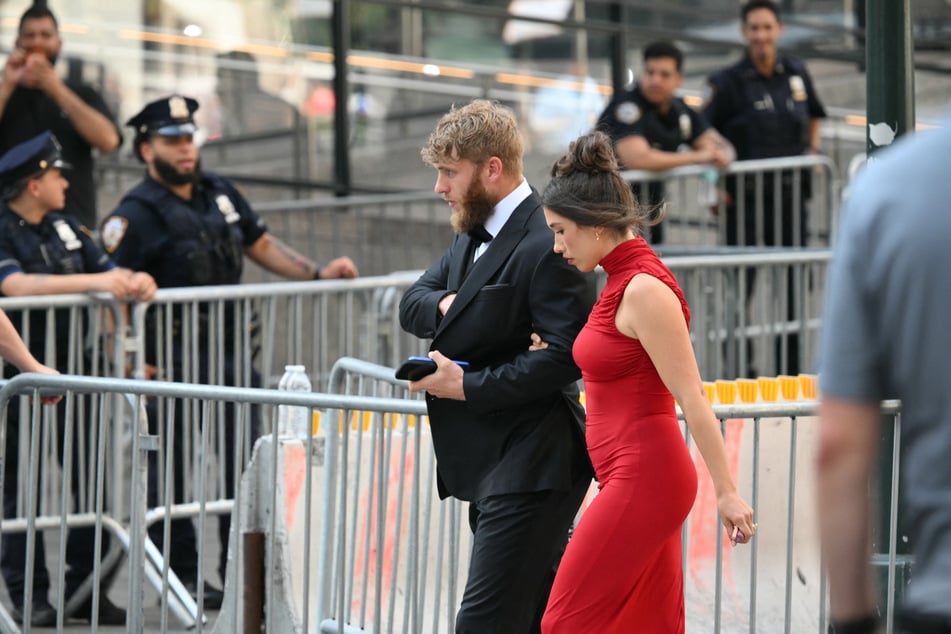 Seattle Seahawks player Cooper Kupp (l.) and his wife, Anna Marie Kupp, arrive at Madison Square Garden in New York City on July 3, 2026.
