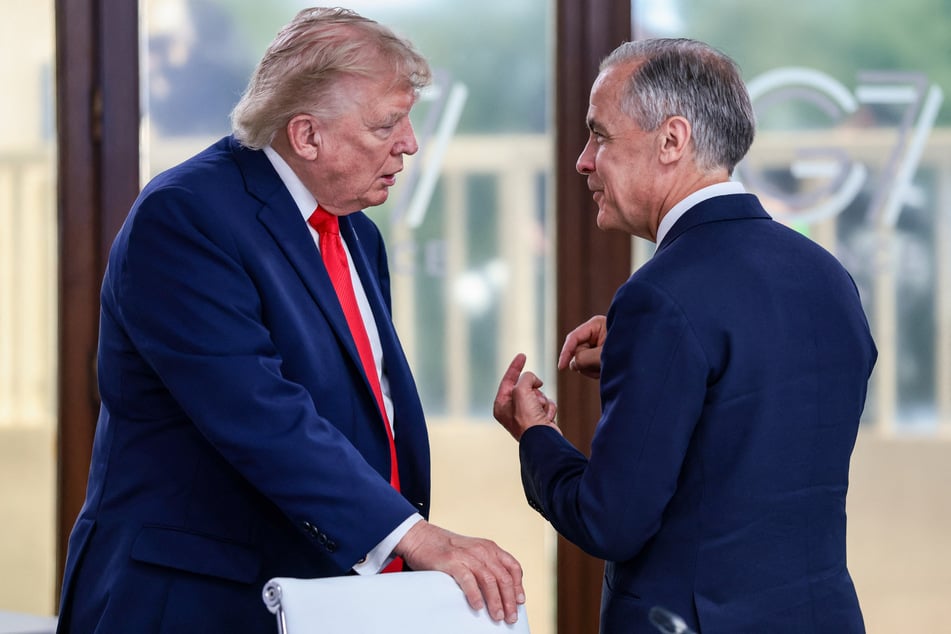 Canadian Prime Minister Mark Carney (r.) called the newly announced US-Iran peace deal a potential "game changer."