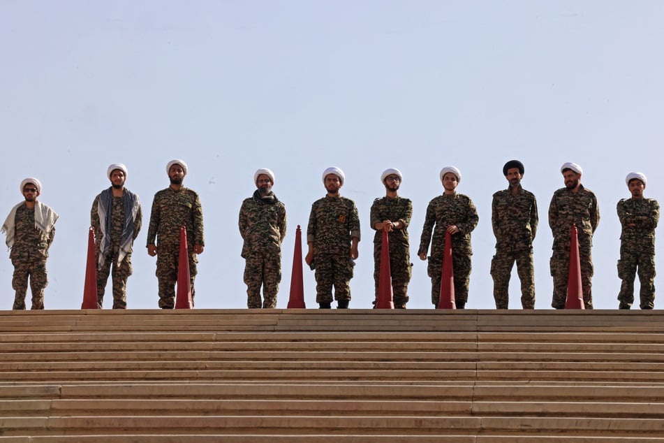 Iranian Revolutionary Guard Corps clerics prepare for the funeral of Iranian Supreme Leader Ali Khamenei, who was killed by US strikes on the first day of the war.