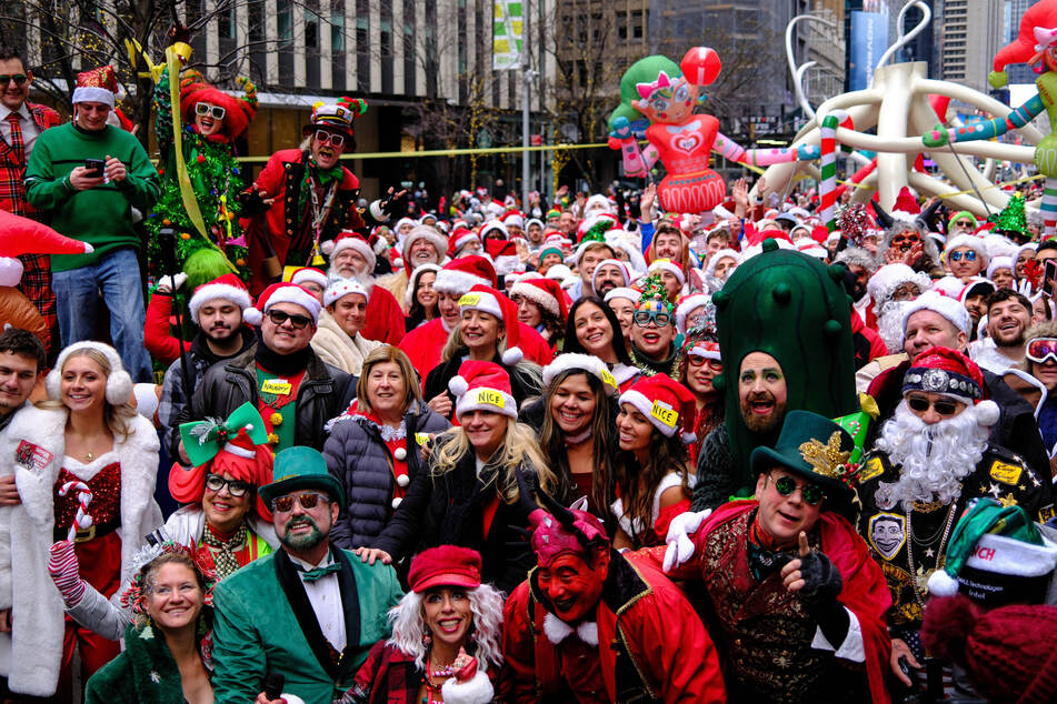The head of New York's SantaCon bar crawl has been charged for allegedly stealing more than $1 million from the event.