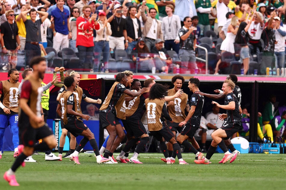 World Cup: Canada reach last 16 for first time as late strike sinks South Africa