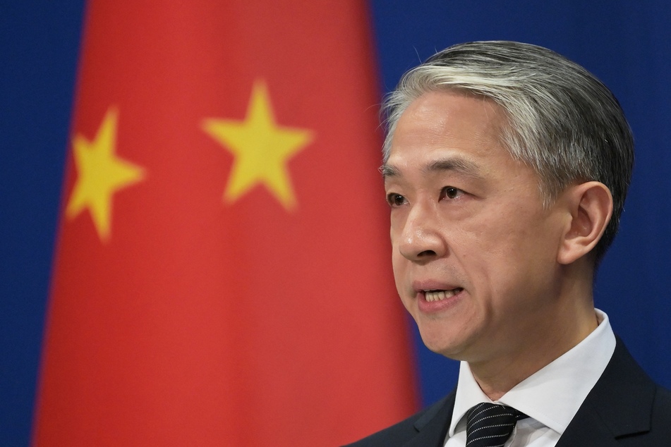 Chinese Foreign Ministry spokesman Wang Wenbin speaks at the Foreign Ministry briefing in Beijing on November 9, 2020.