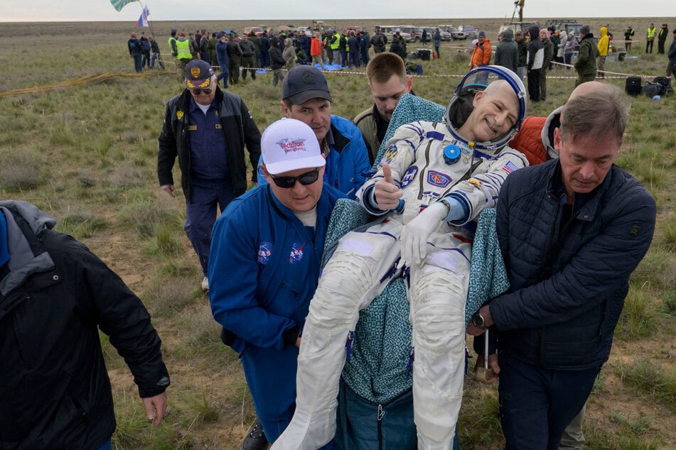 NASA's oldest astronaut returns to Earth on his birthday after months in space!