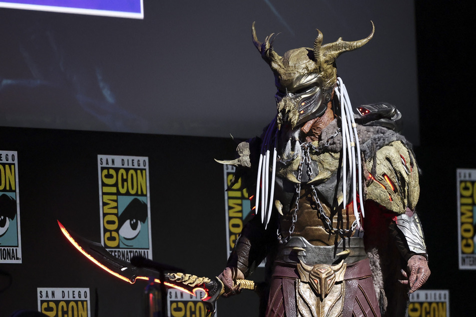 A character Predator poses onstage at 20th Century Fox's Predator: Badlands panel during 2025 Comic-Con International: San Diego on July 25, 2025.
