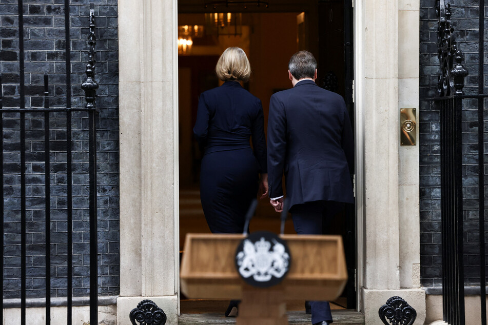 Truss walks away after delivering her short resignation speech.