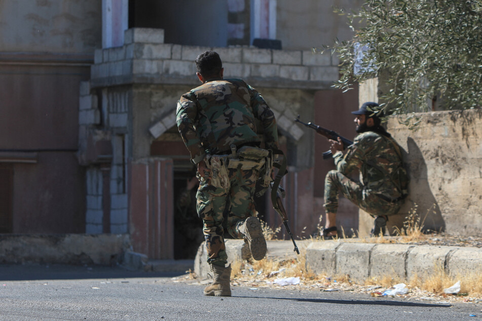 Syria says it's pulling troops from battle-scarred Sweida following US request