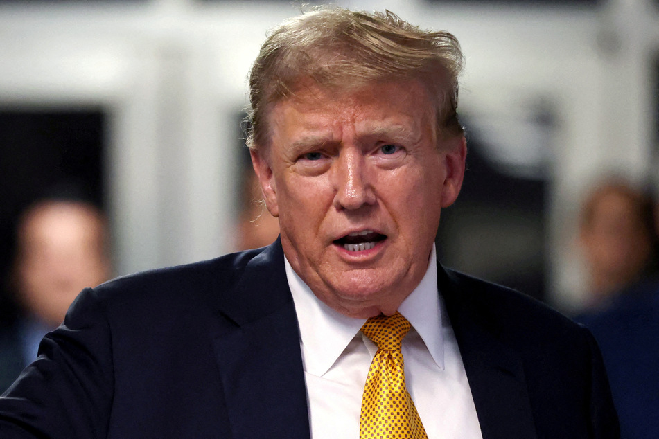 Ex-president Donald Trump speaks to the press during his hush money trial at Manhattan Criminal Court in New York City.
