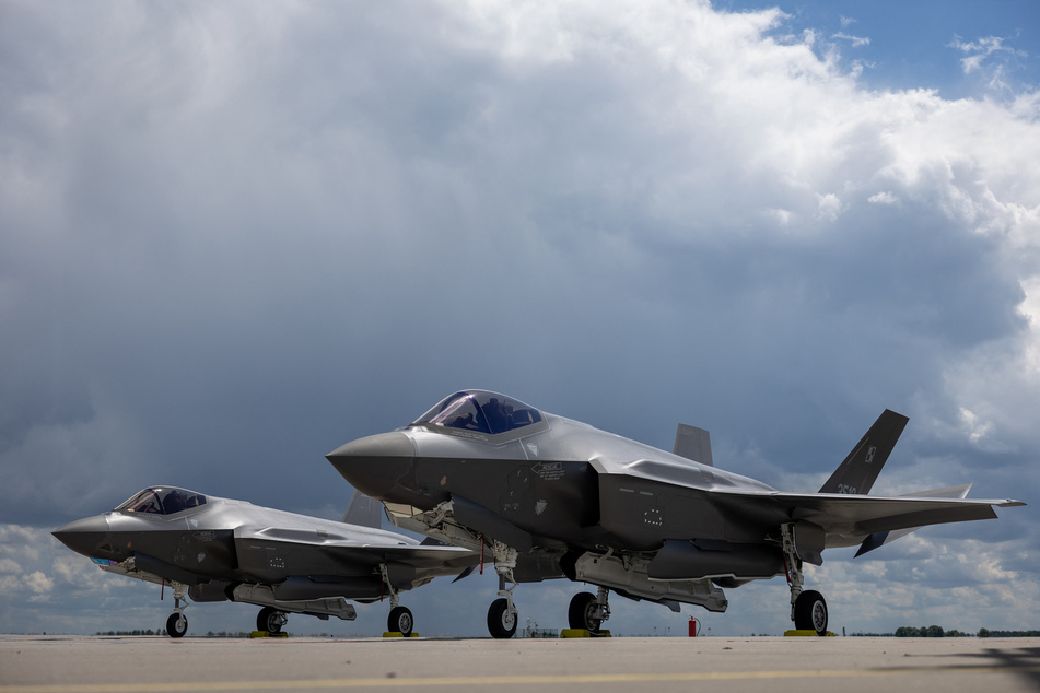 Two US-made F-35 aircrafts are parked on the tarmac at the 32nd Tactical Air Base in Lask, Poland, on June 12, 2026.