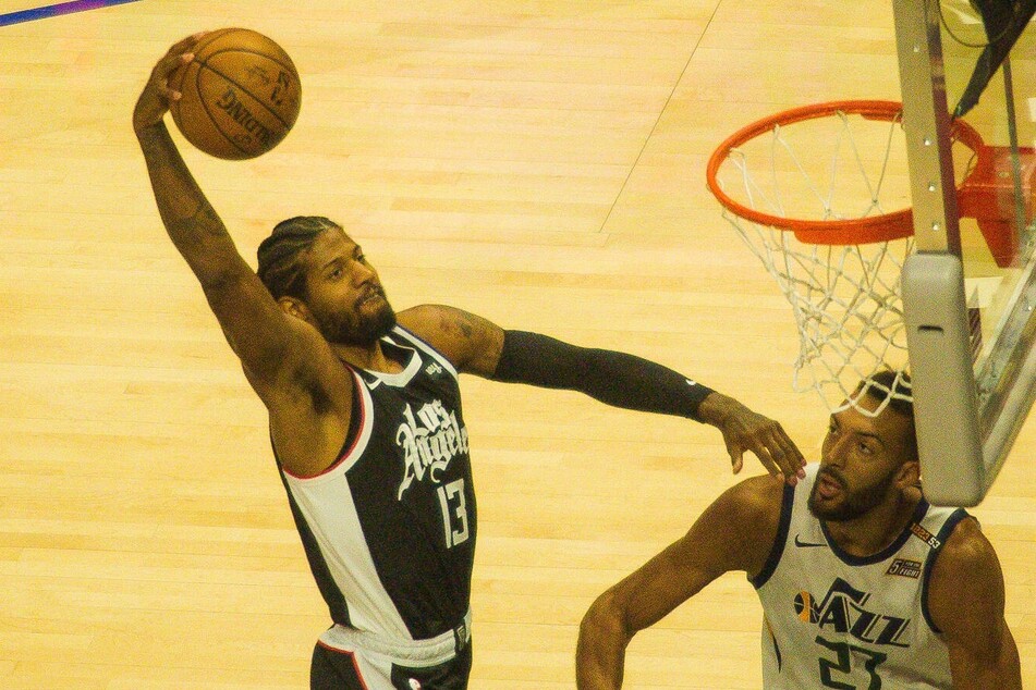 Paul George (l) lead all scorers with 37 points as the Clippers took a 3-2 series lead over the Jazz on Wednesday night.