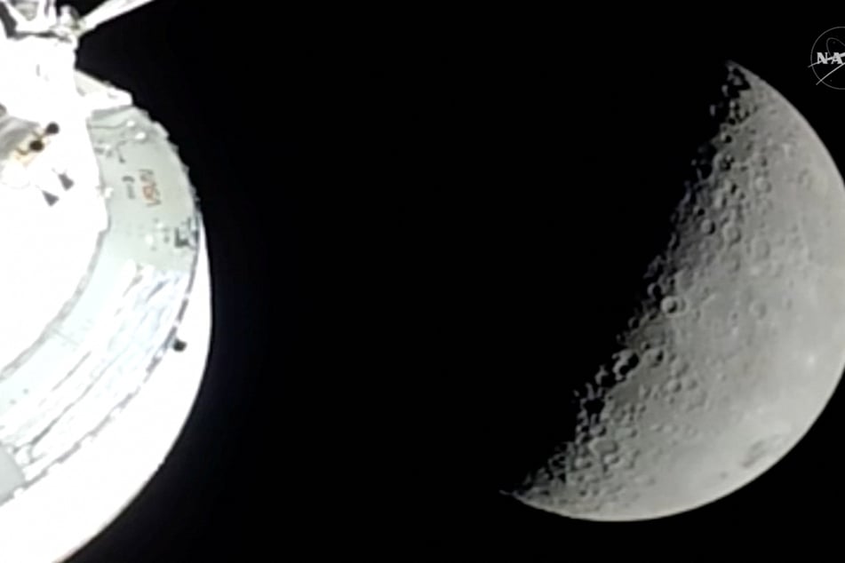 Artemis II astronauts head back to Earth after record-breaking and emotional lunar flyby