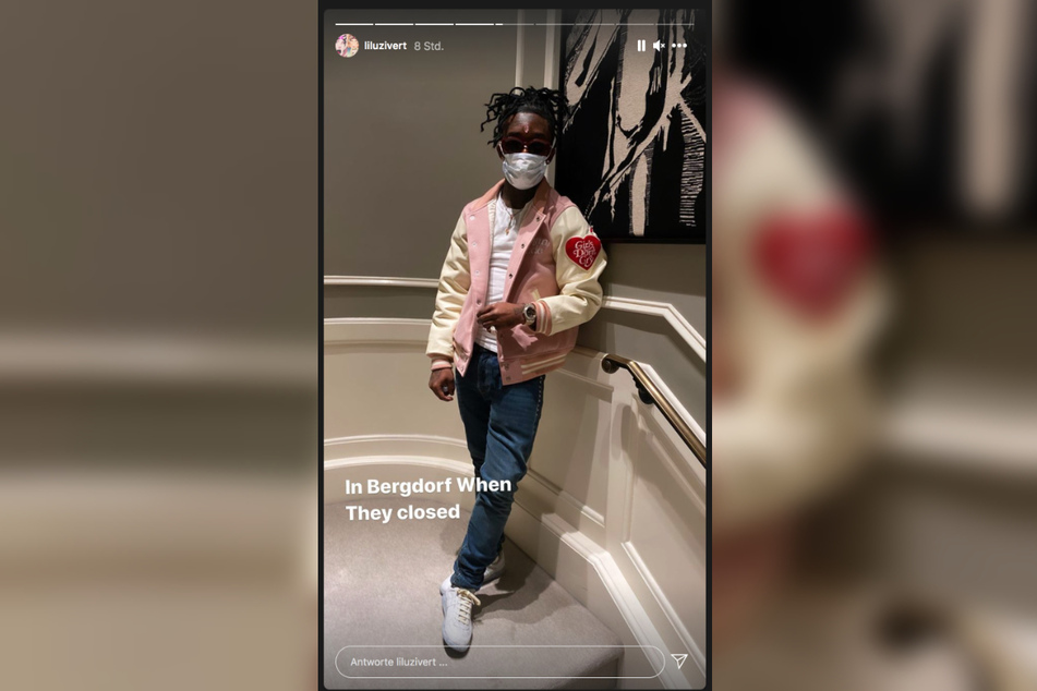 Lil Uzi Vert poses with a mask and his new forehead bling.