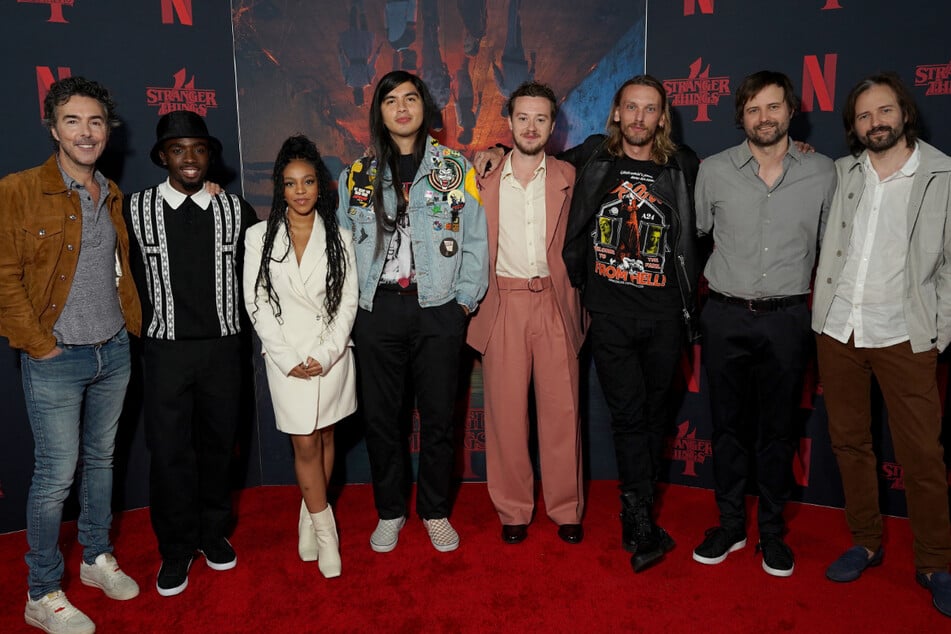 (From l. to r.) Stranger Things executive producer Shawn Levy, actors Caleb McLaughlin, Priah Ferguson, Eduardo Franco, Joseph Quinn, Jamie Campbell Bower, and creators Ross and Matt Duffer at Netflix's Stranger Things SAG event on Sunday.