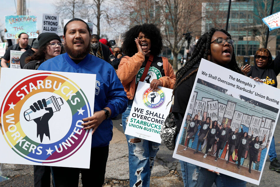From l. to r.: Beto Sanchez, Nikki Taylor, and Nabretta Hardin – three members of the Memphis Seven – march to their Starbucks store during a labor rights protest.