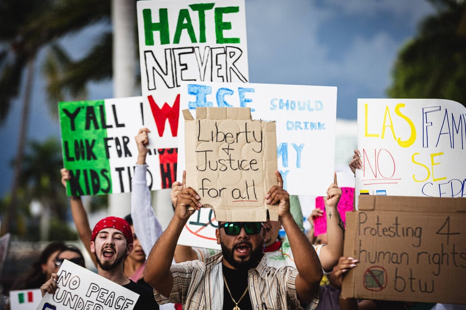 Protesters rally against US Immigration and Customs Enforcement in Florida on August 26. ICE's intimidation of David Streever was on Tuesday ruled a possible First Amendment violation.