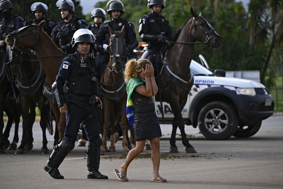 Brazilian law enforcement officers have taken roughly 1,200 protestors into custody after clearing a protest camp on Monday.