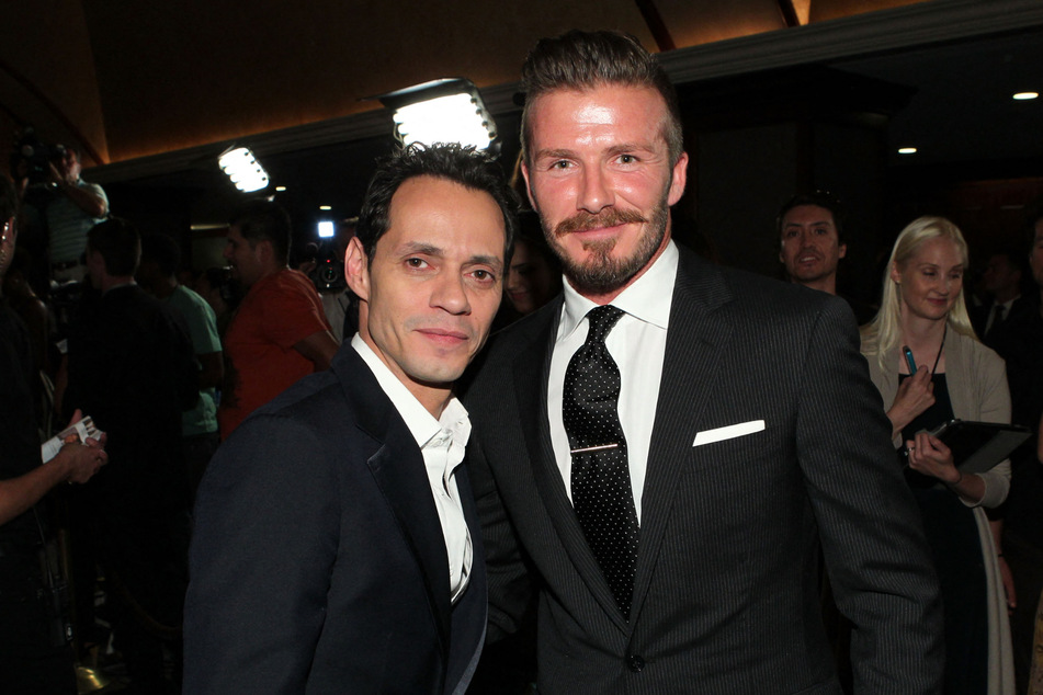 Marc Anthony (l.) and David Beckham have been close for years.