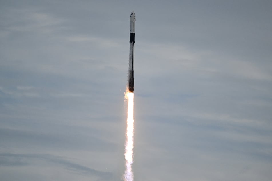 SpaceX Falcon 9 rocket topped with the Crew Dragon capsule lifts off for NASA's SpaceX Crew-13 mission on Thursday. The four crew members are expected to stay on the ISS for about six months.