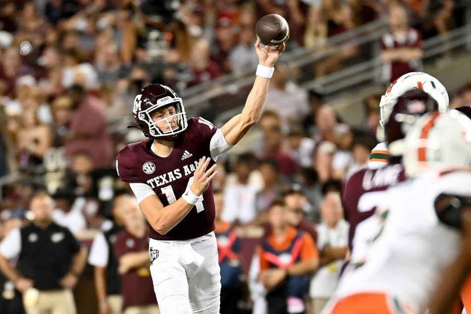 Max Johnson of the Texas A&M Aggies throws a pass against the Miami Hurricanes during the second quarter of the game at Kyle Field.