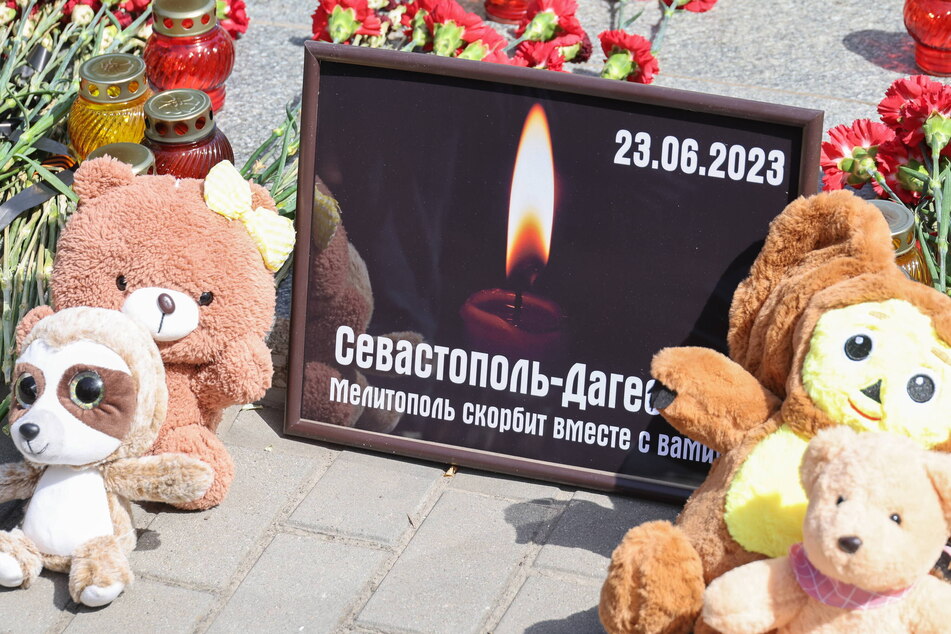 A makeshift memorial to the victims of Ukraine's June 23 missile strike on Sevastopol which killed four people, including two children.