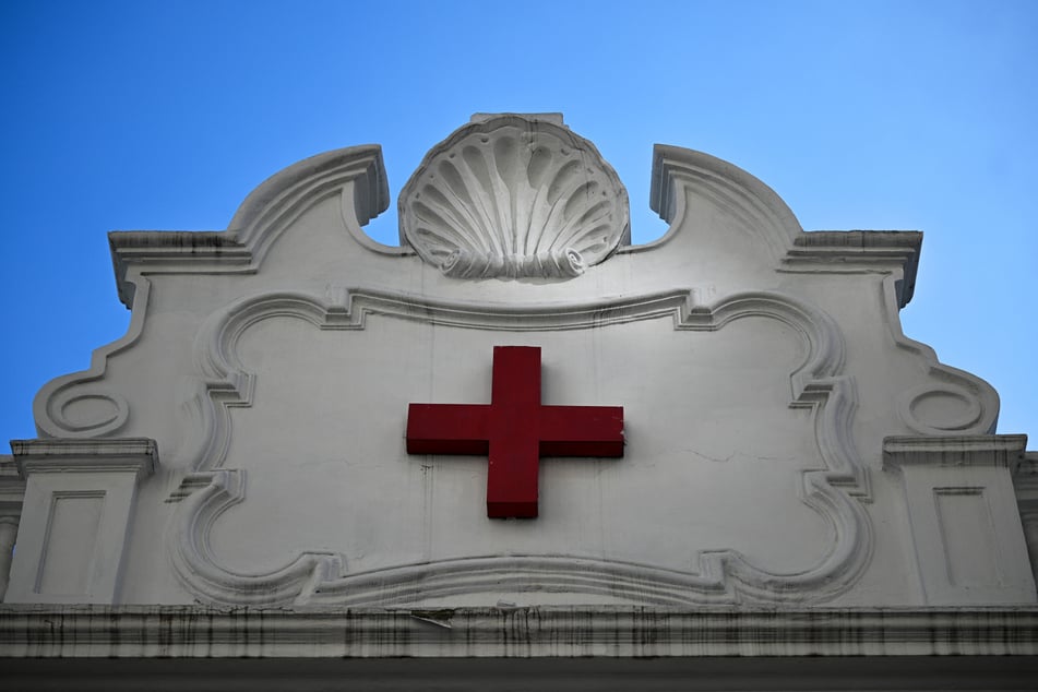 View of the Red Cross logo at its headquarters in Caracas, Venezuela on August 5, 2023.