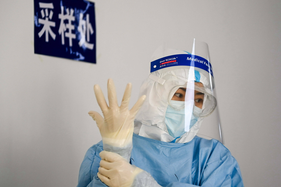 Previously, cotton swabs were used to take samples from the nose or throat. In China, they may now be inserted into another orifice as well.