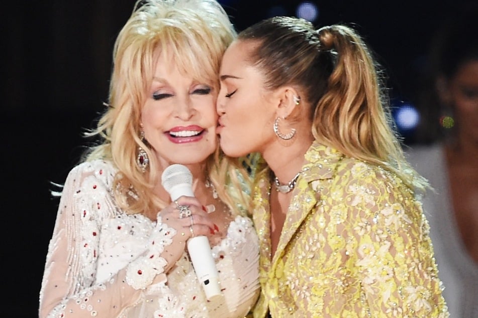 Miley Cyrus shared what she and Dolly Parton (l) chatted about before the country legend passed away in August.